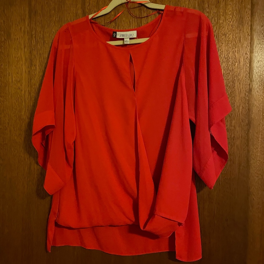 Jennifer Lopez blouse. Red orange sheer sleeves